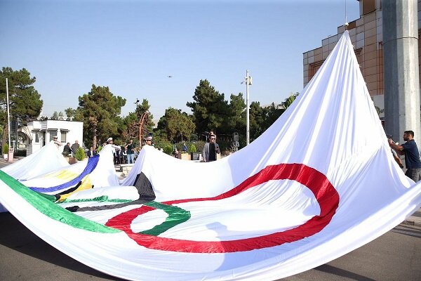 بزرگترین پرچم پنج حلقه در کمیته ملی المپیک به اهتزار درآمد
